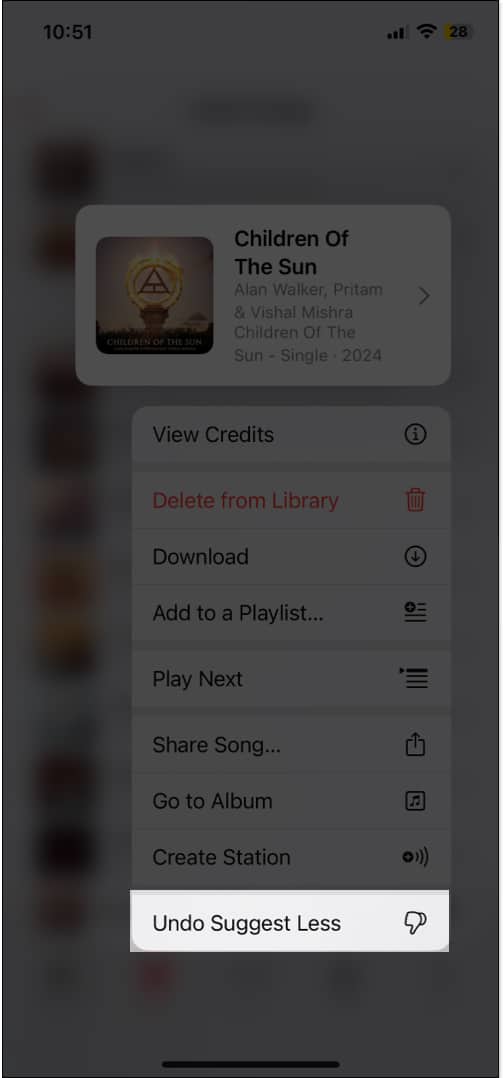 Long press any song and select Undo Suggest Less