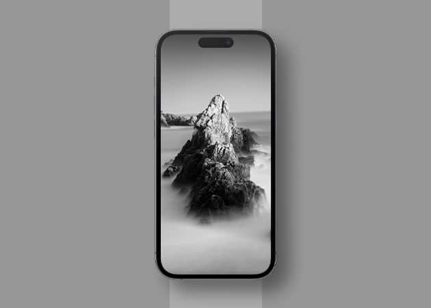 Mountain peak in dark setting iPhone wallpaper