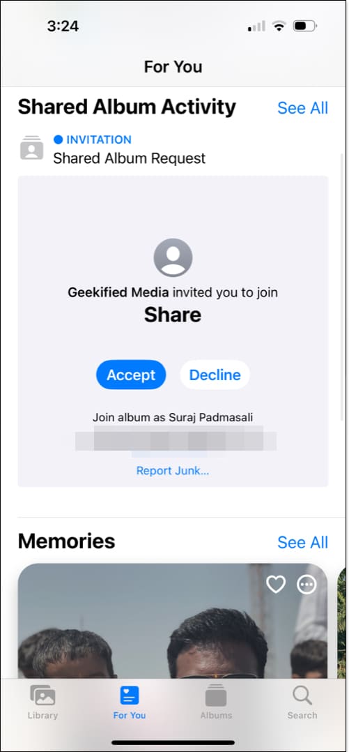 A Shared Album invitation in the Photos app on an iPhone