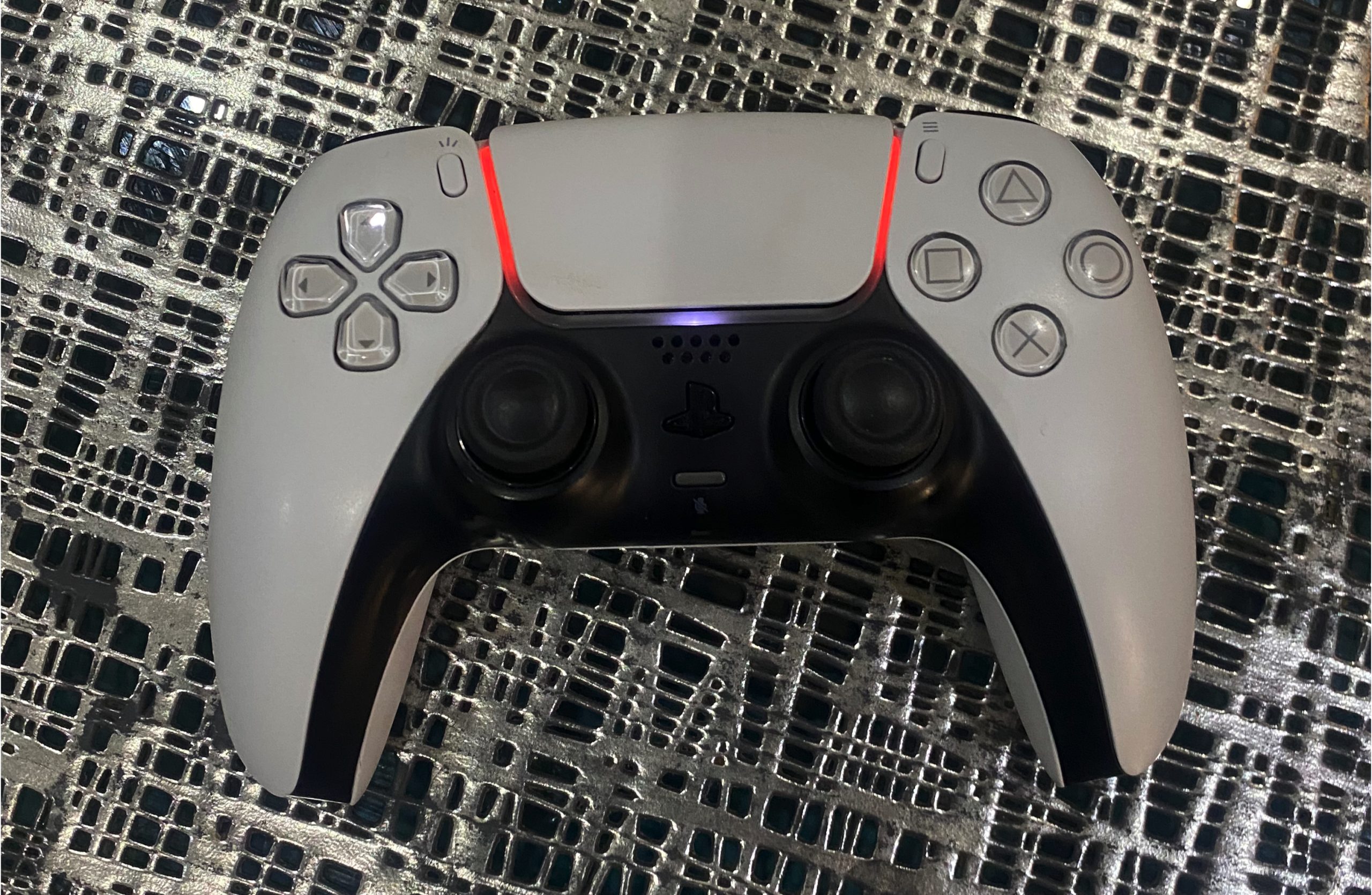 PS5 controller connected to iPhone