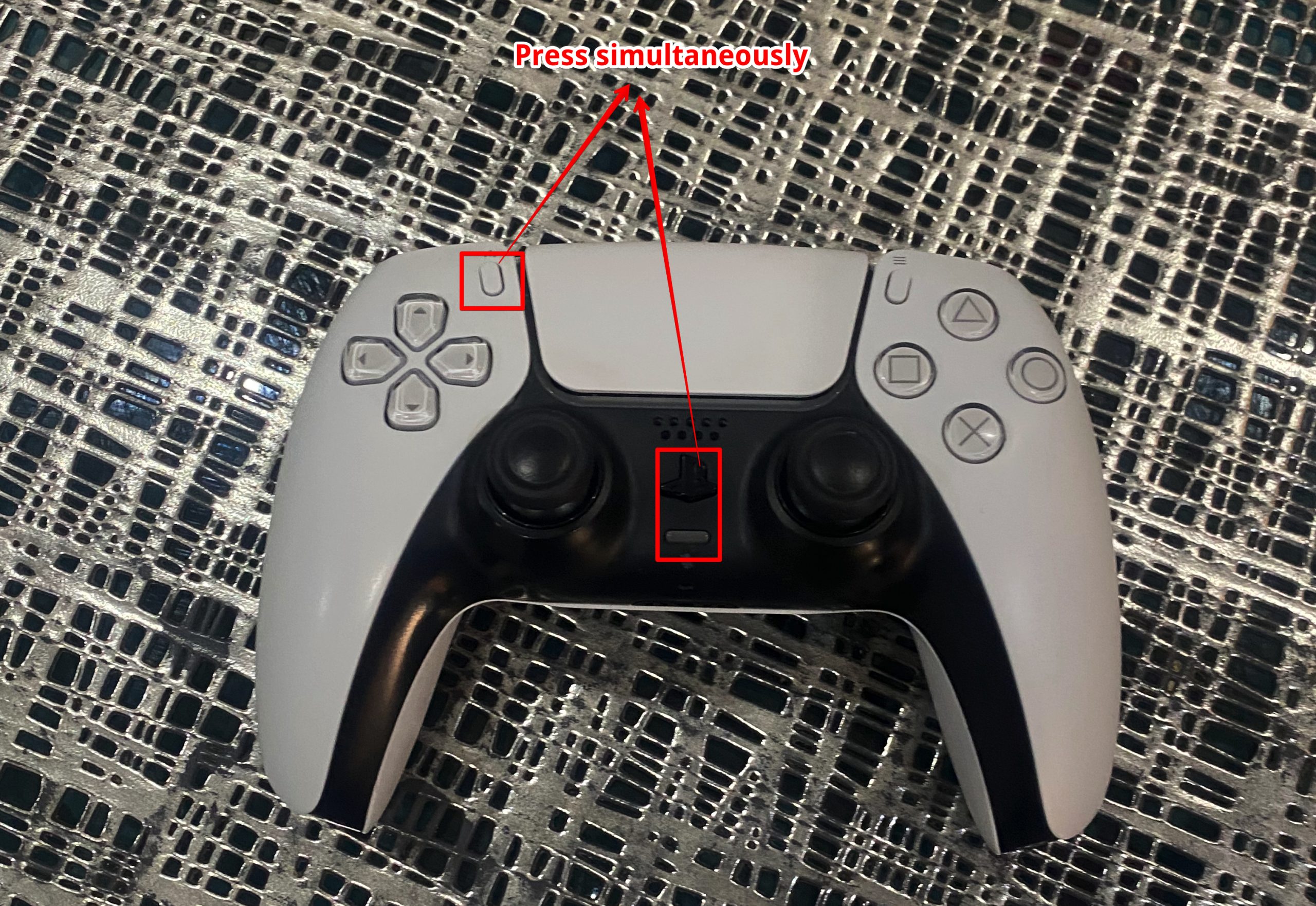 Press PS5 Home and Share buttons simultaneously