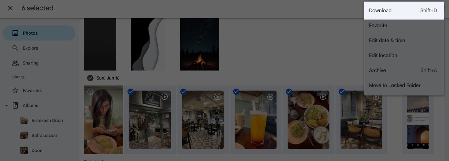 Download button on the Google Photos website to download selected photos