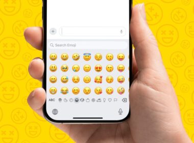 Accessing and using the Emoji keyboard on an iPhone.